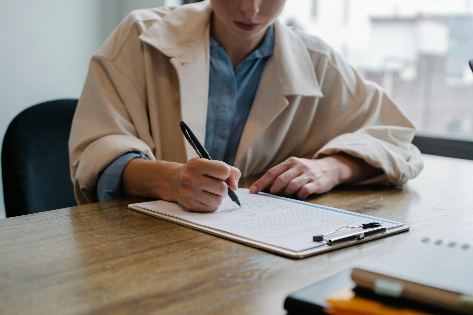 nurse writing something after getting here questions answered